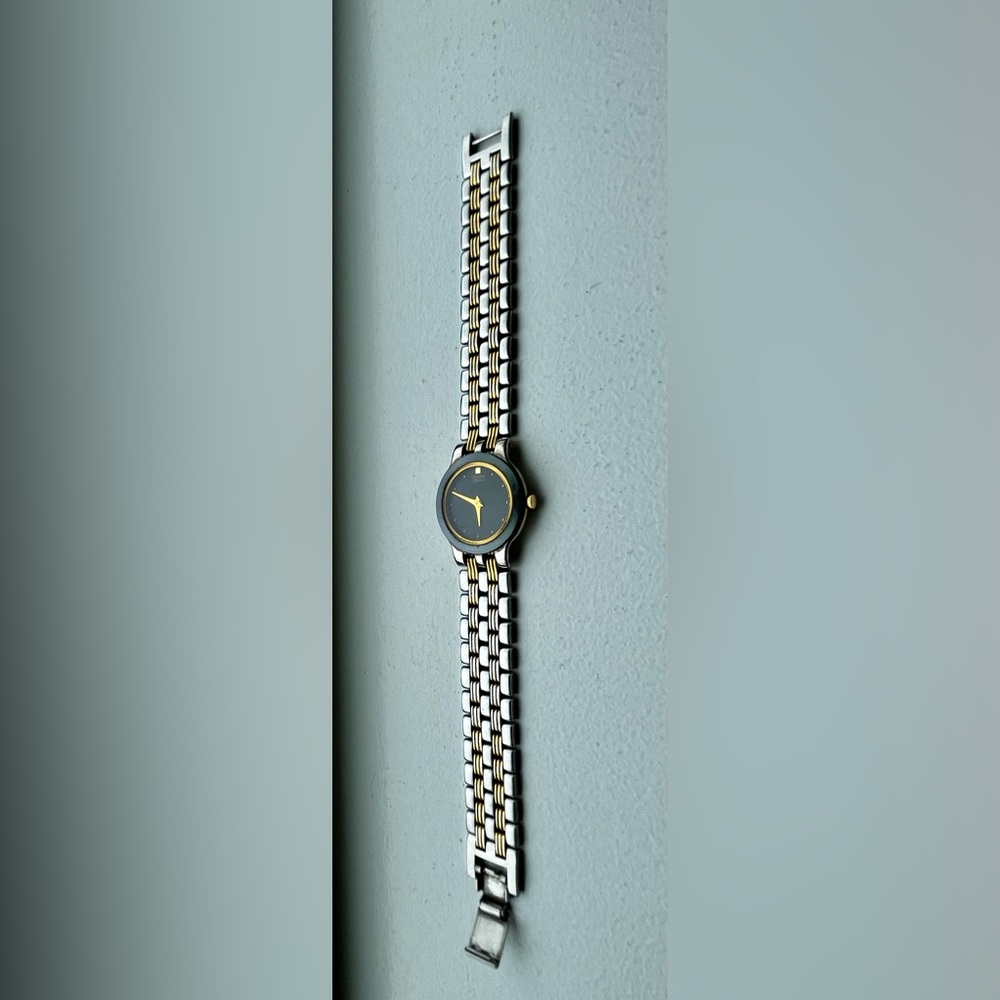 Citizen Two-Tone Black and Gold Bracelet Watch